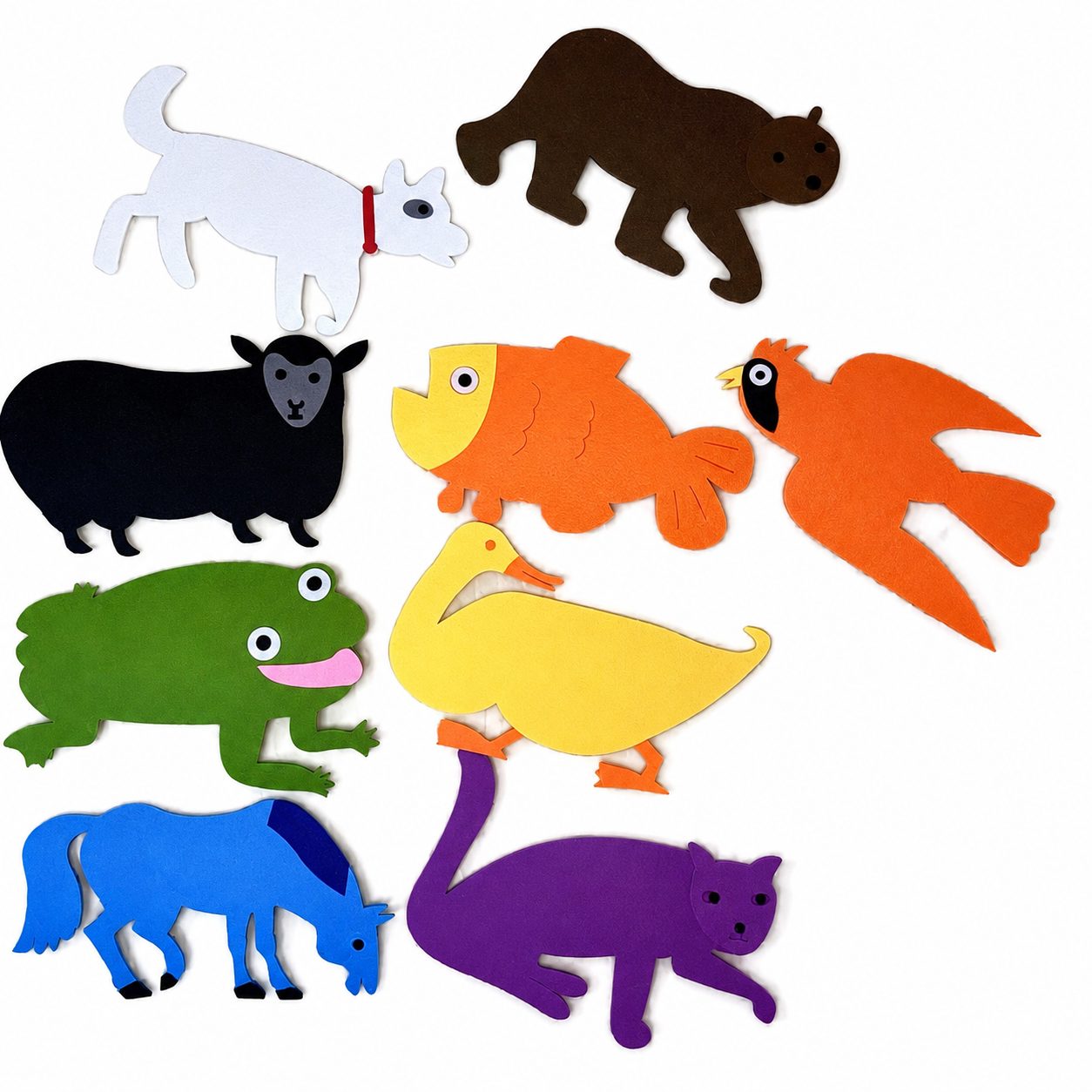Close-up of colourful felt animal pieces including a yellow duck, green frog, orange fish and purple cat