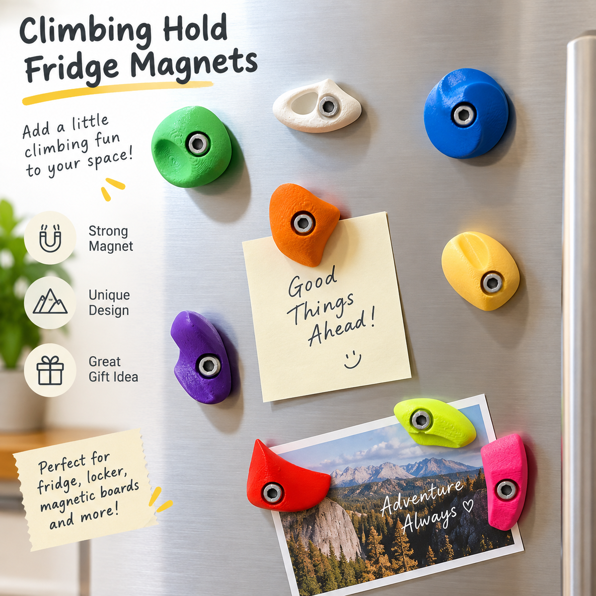 Colourful miniature climbing hold fridge magnets displayed on a refrigerator holding notes and a mountain postcard.